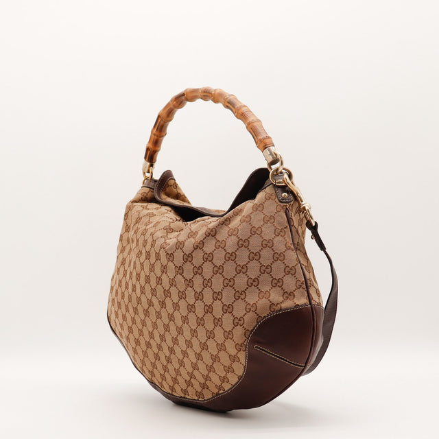 Détail anse en bambou Gucci Hobo toile GG occasion authentique — AMANA Vintage