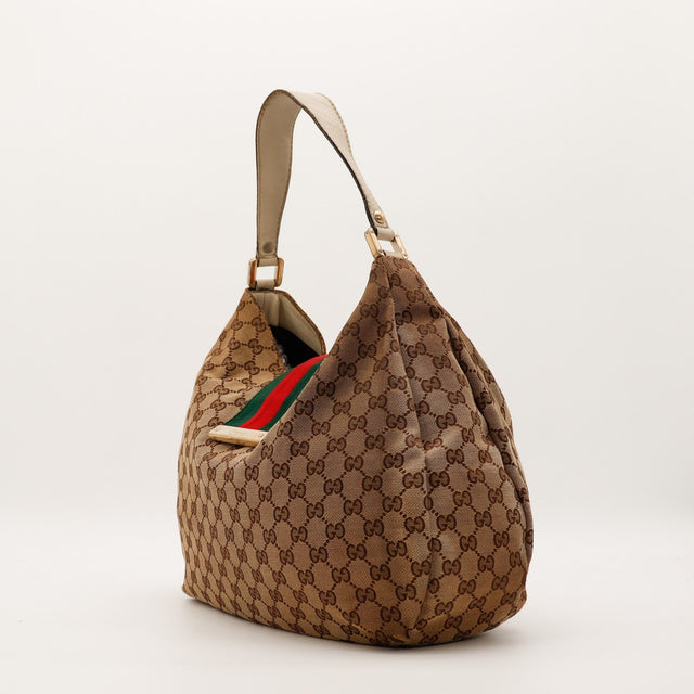 Gucci Hobo Web vue de profil gauche toile GG Canvas beige occasion — AMANA Vintage