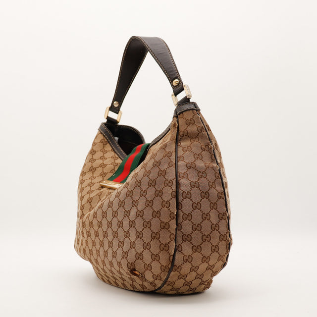 Vue de côté Gucci Hobo Web canvas GG marron bandoulière cuir occasion — AMANA Vintage