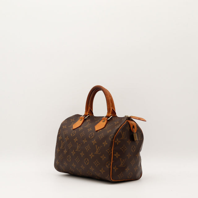 Detail cuir vachette patine caramel Louis Vuitton Speedy 25 occasion authentique — AMANA Vintage