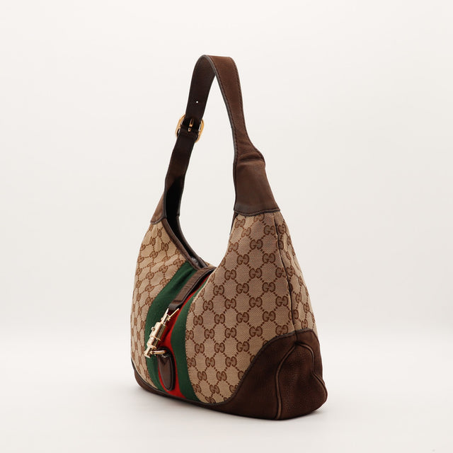 Vue de trois-quarts Gucci New Jackie toile monogrammée cuir grainé marron — AMANA Vintage