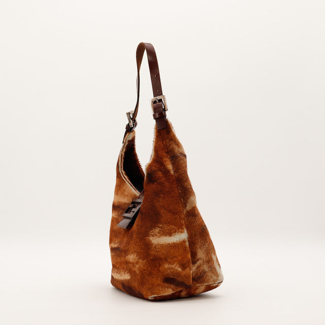 Vue de profil gauche sac Fendi Hobo poil de veau marron vintage — AMANA Vintage