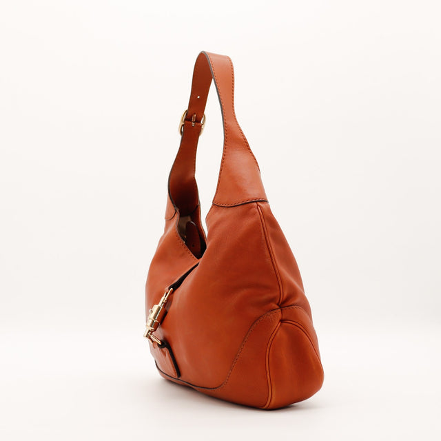 Sac Gucci New Jackie cuir cognac vue de profil gauche occasion authentique — AMANA Vintage