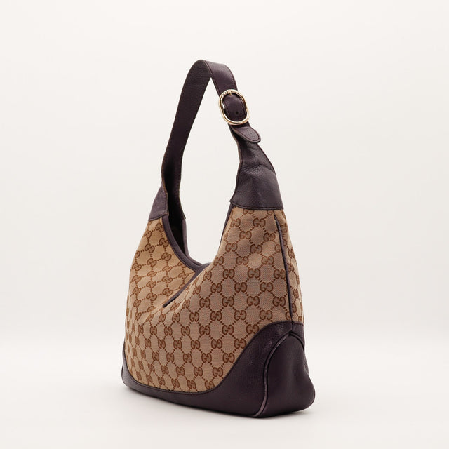 Vue de côté sac Gucci New Jackie cuir prune grené occasion — AMANA Vintage