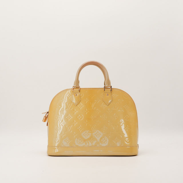 Vue de dos Louis Vuitton Alma MM Vernis kaki occasion authentique — AMANA Vintage