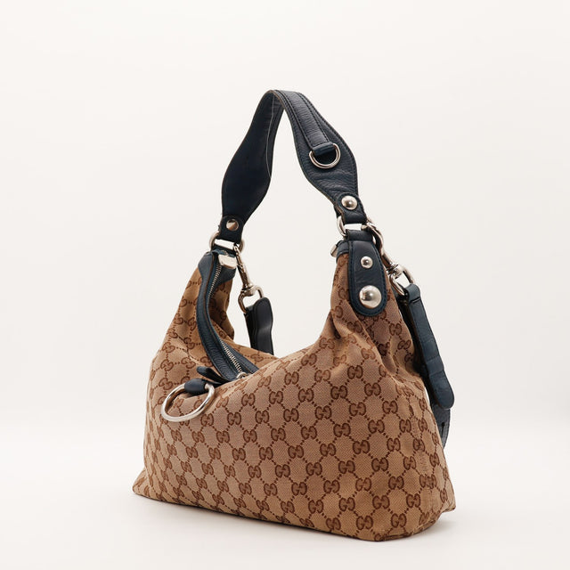 Hobo Gucci bicolore beige bleu marine vue de trois quarts droite — AMANA Vintage