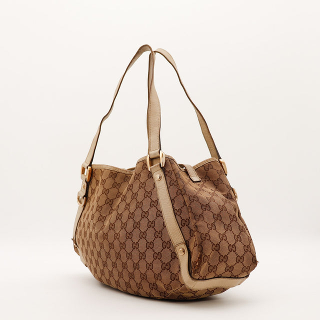 Hobo Gucci toile monogrammée beige vue de trois quarts gauche — AMANA Vintage