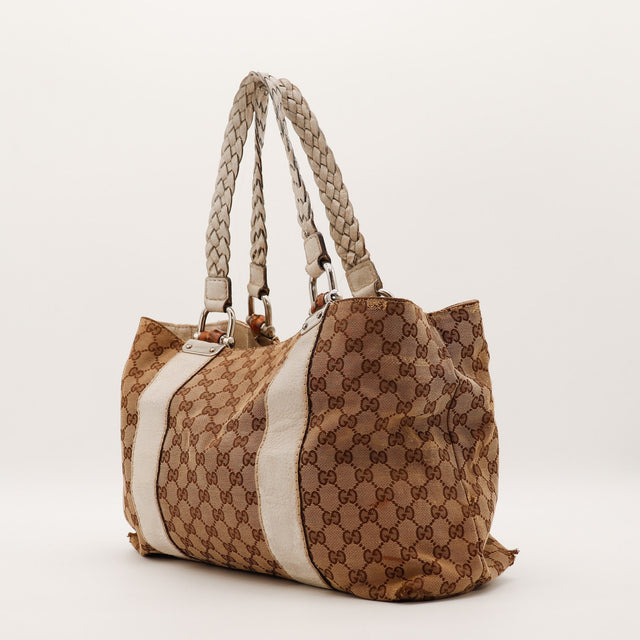 Vue de trois quarts Tote Bag Bambou Gucci bandes cuir ivoire toile monogrammée — AMANA Vintage