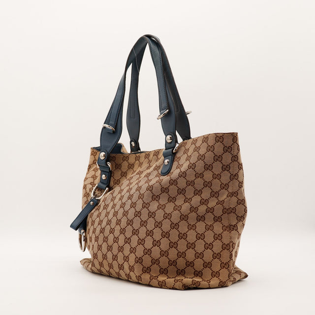 Tote Bag Gucci vue de trois quarts gauche toile monogrammée bleu marine — AMANA Vintage