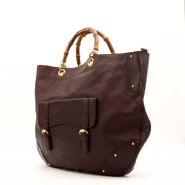 Vue de trois-quarts Tote Bag Bambou Gucci cuir embossé brun anses bambou dorées — AMANA Vintage