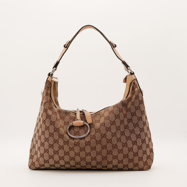 Hobo Gucci toile monogrammée beige marron vue de face anneau argenté occasion authentique — AMANA Vintage