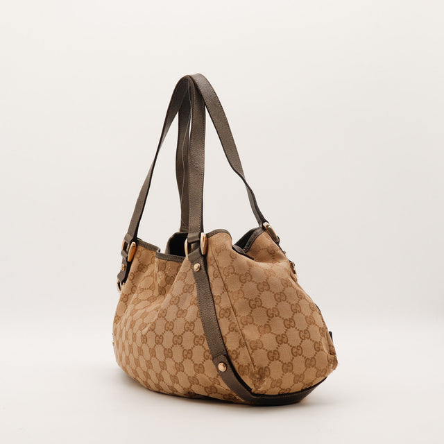 Hobo Gucci vue de trois quarts gauche toile monogrammée — AMANA Vintage