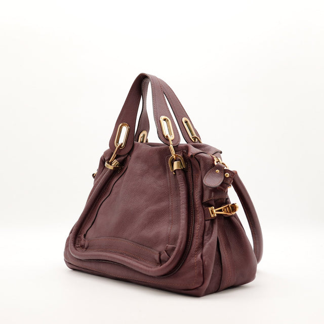 Chloé Paraty bordeaux vue de trois quarts détail ferrures dorées occasion — AMANA Vintage