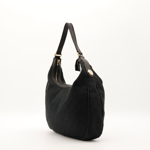 Gucci Hobo GG Canvas noir vue de profil gauche occasion — AMANA Vintage