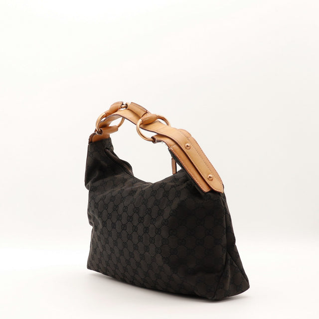 Vue de dos Gucci Hobo Horsebit toile monogrammée marron foncé et noir occasion authentique — AMANA Vintage