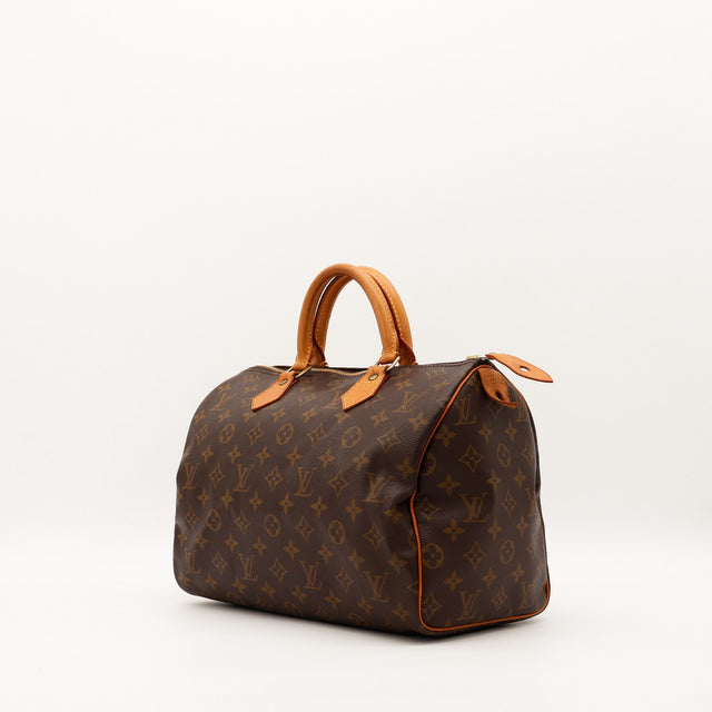 Louis Vuitton Speedy 30 vue de trois quarts angle gauche toile Monogram patine caramel — AMANA Vintage