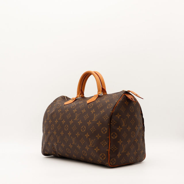 Louis Vuitton Speedy 35 vue trois quarts Toile Monogramme cuir vachette caramel — AMANA Vintage