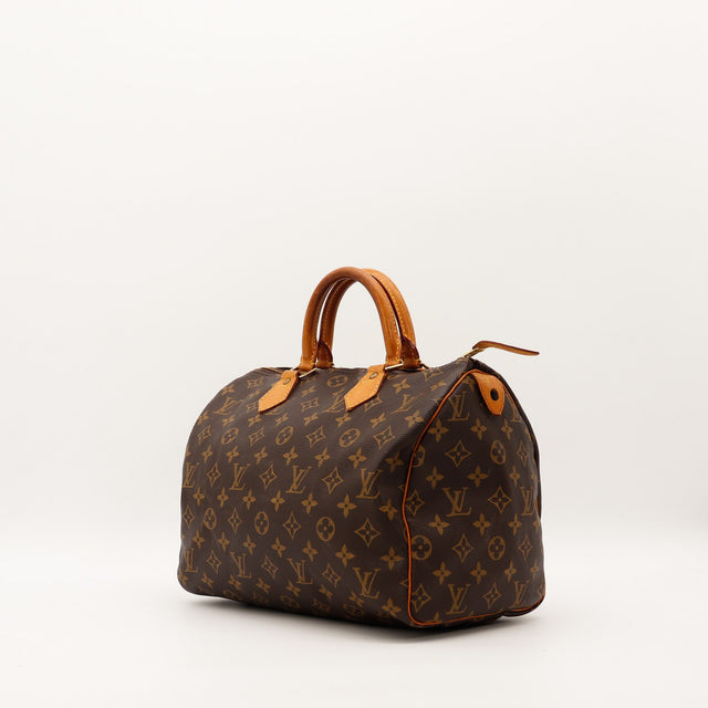 Louis Vuitton Speedy 35 vue de trois quarts gauche toile monogramme cuir vachette caramel — AMANA Vintage