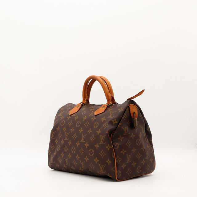 Louis Vuitton Speedy 35 vue trois quarts gauche toile Monogram patine caramel — AMANA Vintage