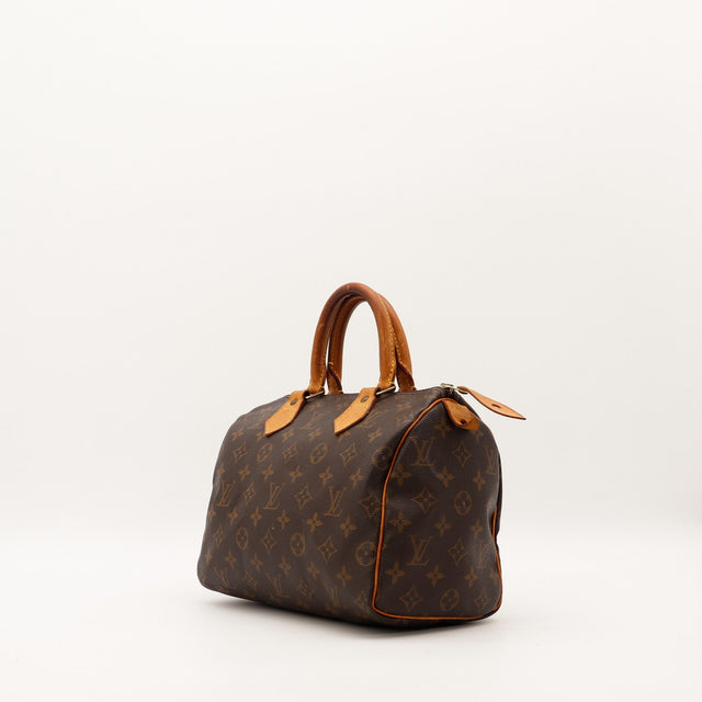 Louis Vuitton Speedy 25 vue trois quarts gauche patine caramel — AMANA Vintage