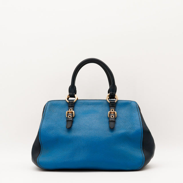 bolso Miu Miu Bauletto piel Madras bicolor vista lateral auténtico de segunda mano — AMANA Vintage