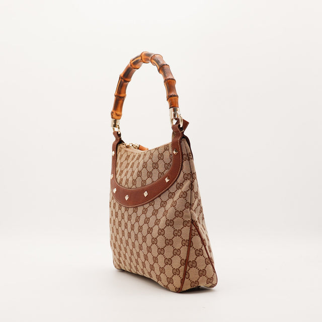 Mala Gucci Hobo Bamboo perfil lateral vintage autêntica — AMANA Vintage