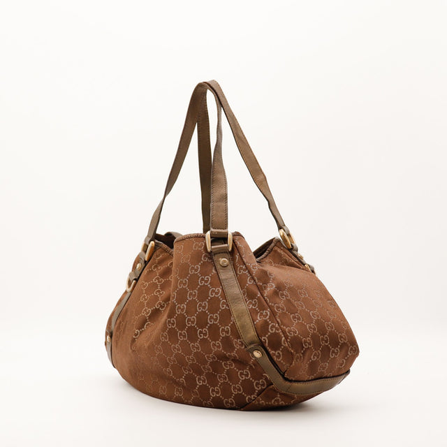 Sac Gucci Hobo toile monogrammée vue de profil occasion authentique — AMANA Vintage