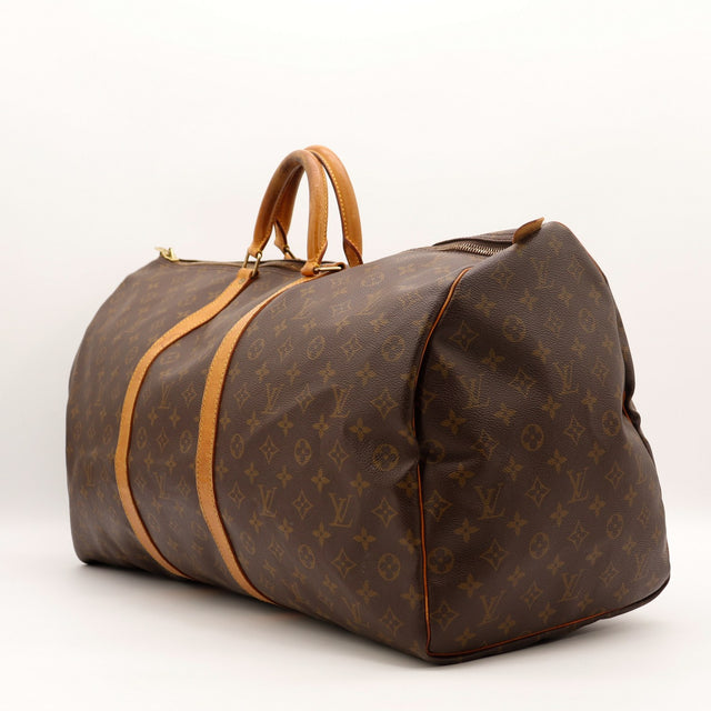 Louis Vuitton Keepall 55 toile Monogram vue de côté occasion authentique — AMANA Vintage