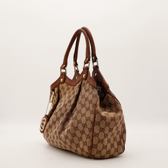 Sac Gucci Sukey vue de profil cuir marron occasion authentique — AMANA Vintage