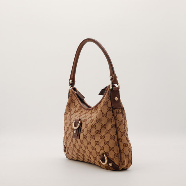Sac Gucci Hobo toile monogrammée vue de trois quarts occasion authentique — AMANA Vintage