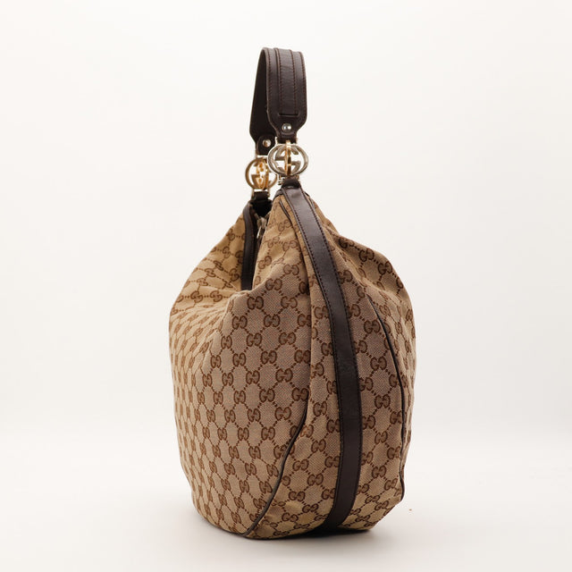 Sac Gucci Hobo Interlocking G vue de profil cuir marron occasion authentique — AMANA Vintage