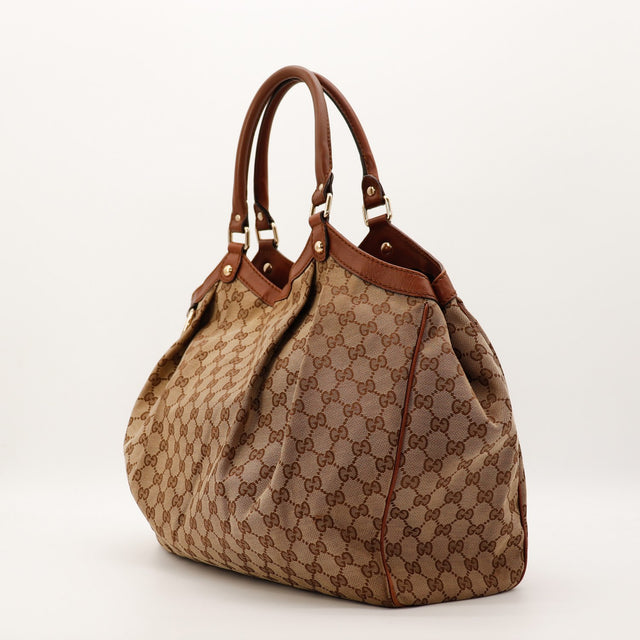 Sac Gucci Sukey vue de profil cuir marron occasion authentique — AMANA Vintage
