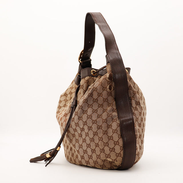 Sac Gucci Hobo GG cuir marron bandoulière vue de profil occasion authentique — AMANA Vintage