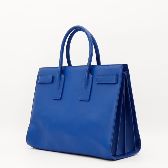 Sac de Jour Saint Laurent bleu vue latérale profil soufflet occasion — AMANA Vintage