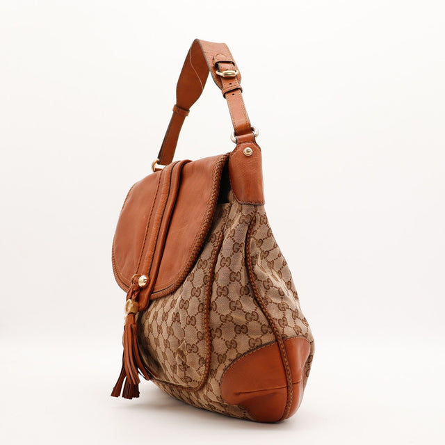 Sac Gucci Hobo cuir marron vue de profil occasion authentique — AMANA Vintage