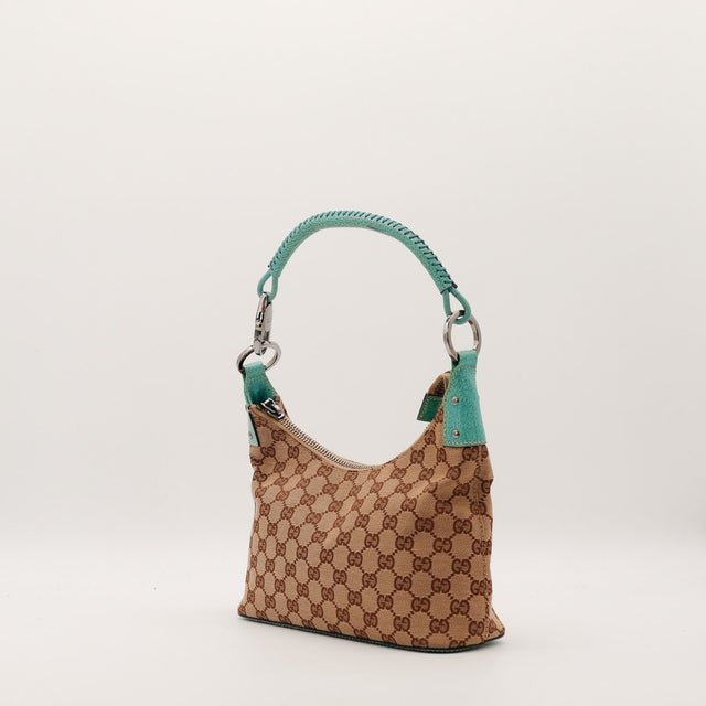 Hobo Gucci toile monogrammée cuir turquoise vue de trois quarts gauche occasion — AMANA Vintage