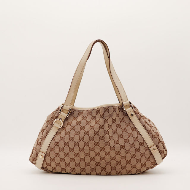 Hobo Gucci toile monogrammée cuir ivoire vue de face occasion authentique — AMANA Vintage
