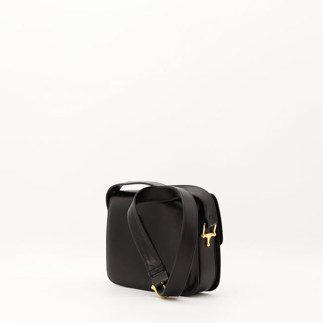 Profil latéral Celine Triomphe cuir noir occasion authentique — AMANA Vintage