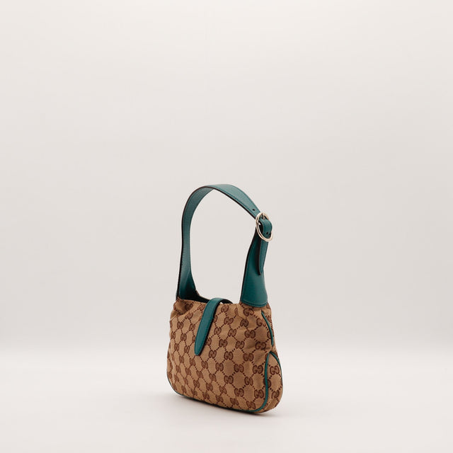 Intérieur doublure textile turquoise du sac Gucci Jackie — AMANA Vintage