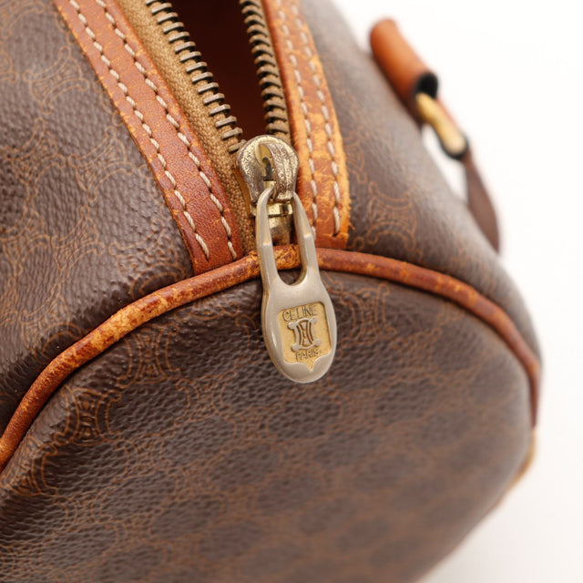 Détail curseur zip Céline Paris plaquage usé métal apparent — AMANA Vintage