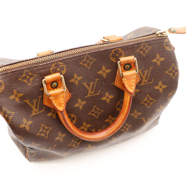 Detail handvatten vachette caramel en bevestigingen Louis Vuitton Speedy 25 — AMANA Vintage
