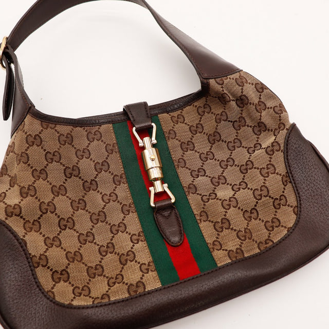 Détail fermeture piston Gucci Jackie occasion authentique — AMANA Vintage