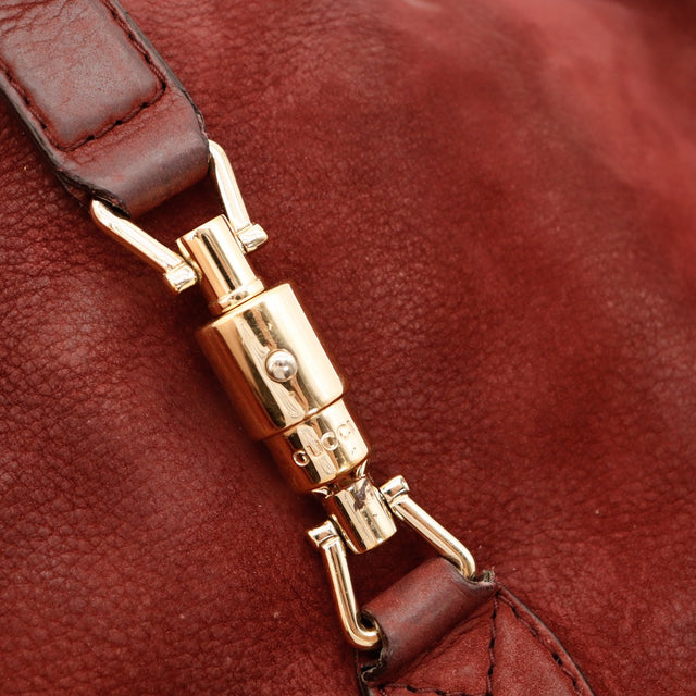 Détail fermoir piston doré Gucci New Jackie occasion authentique — AMANA Vintage