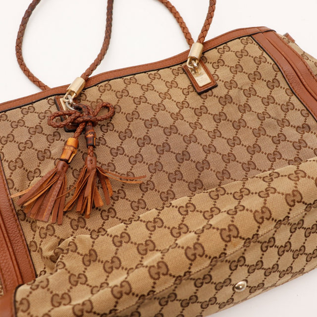Pormenor das borlas de bambu Gucci Tote Bag vintage autêntica — AMANA Vintage