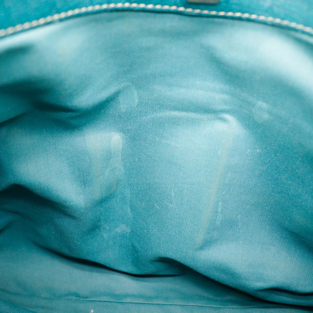 Détail doublure intérieure turquoise sac Gucci Jackie Horsebit — AMANA Vintage