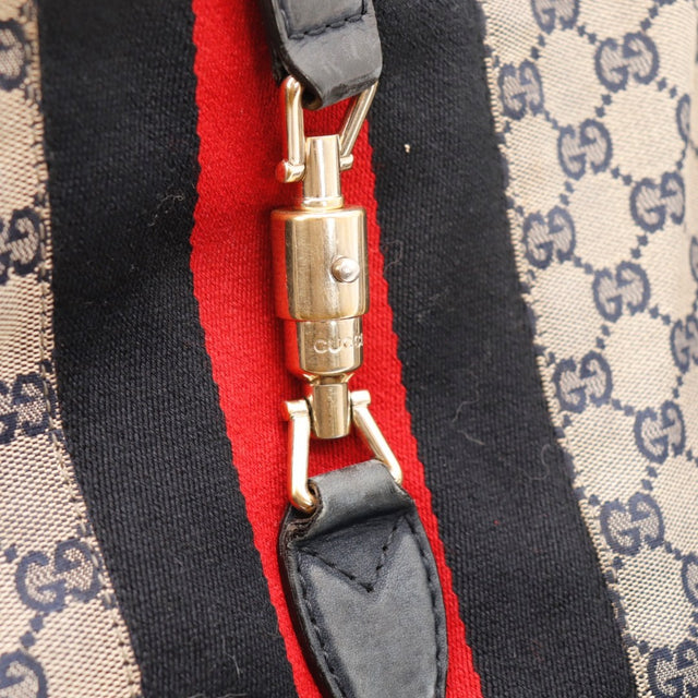 Détail de la bande Web Gucci New Jackie toile monogrammée bleu marine occasion authentique — AMANA Vintage