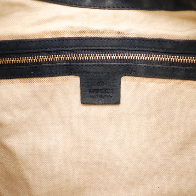 Détail de la base Gucci New Jackie toile monogrammée bleu marine et beige occasion authentique — AMANA Vintage