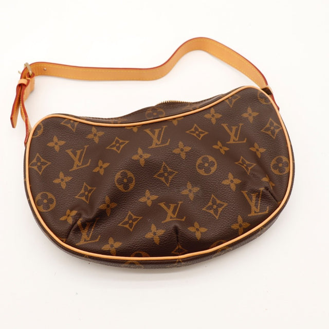 Détail de la fermeture zip Louis Vuitton Croissant PM Toile Monogramme occasion authentique — AMANA Vintage