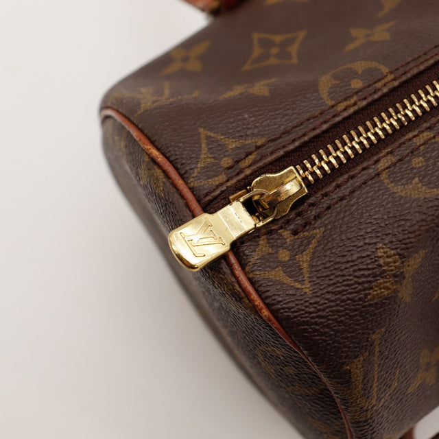 Détail fermeture éclair dorée Louis Vuitton Papillon 30 — AMANA Vintage