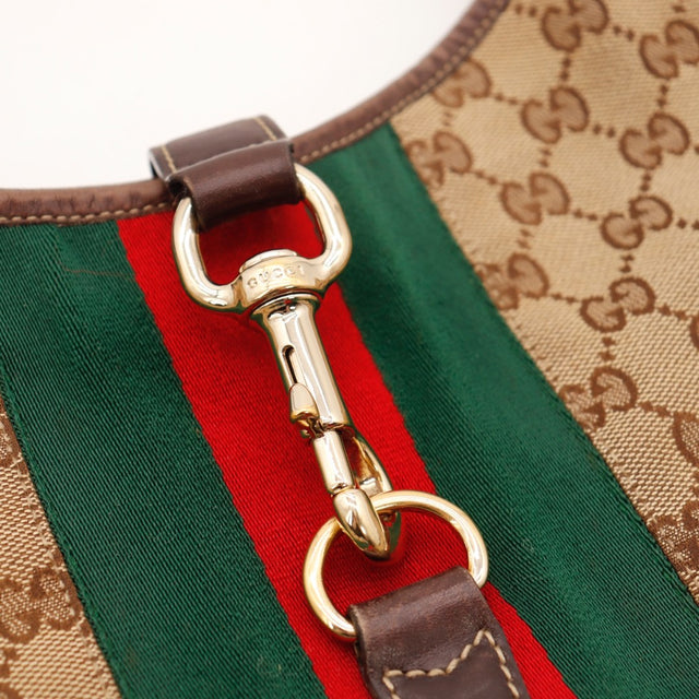Détail de l'anse en cuir Gucci New Jackie occasion authentique — AMANA Vintage